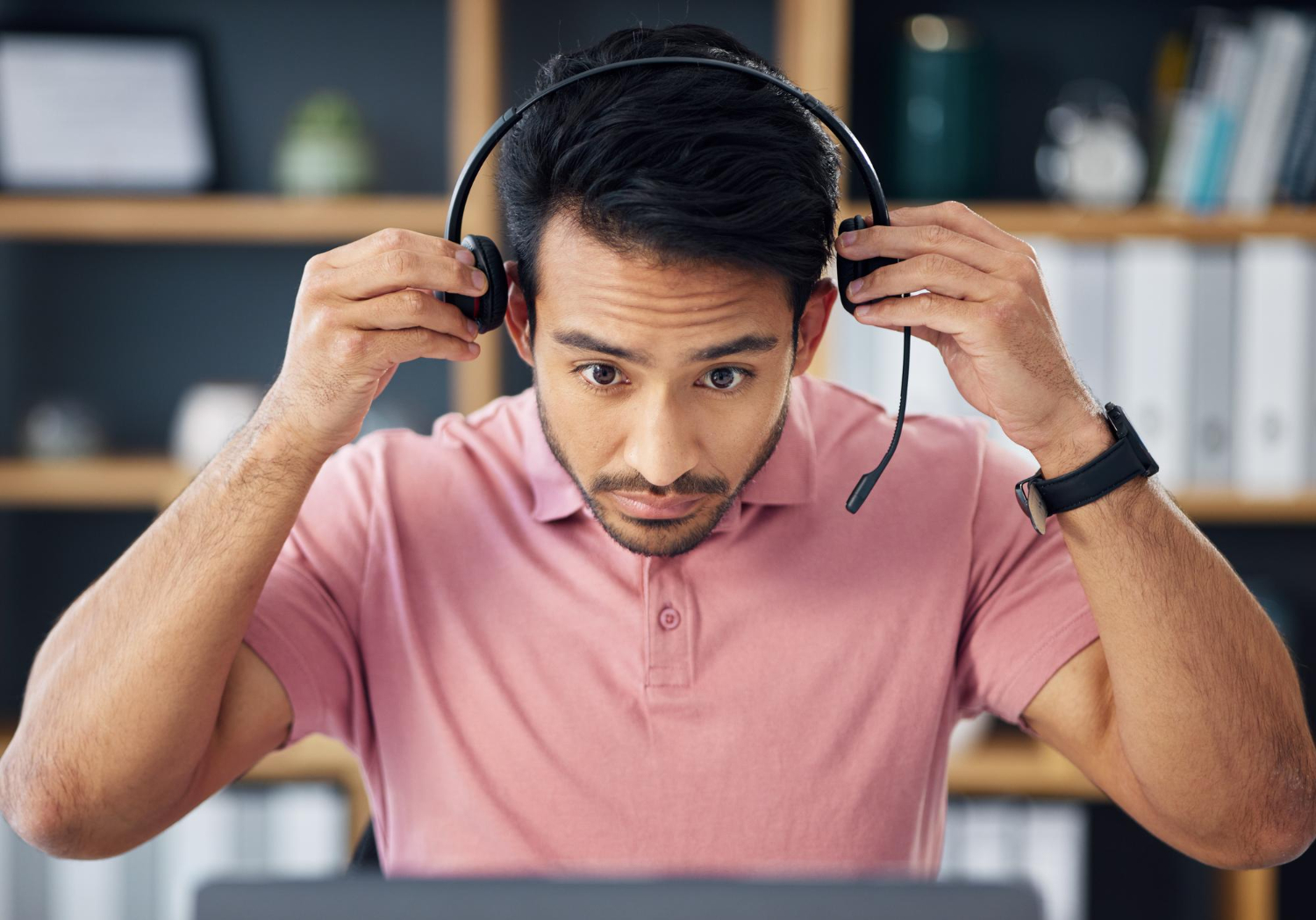 guy puts on headphones
